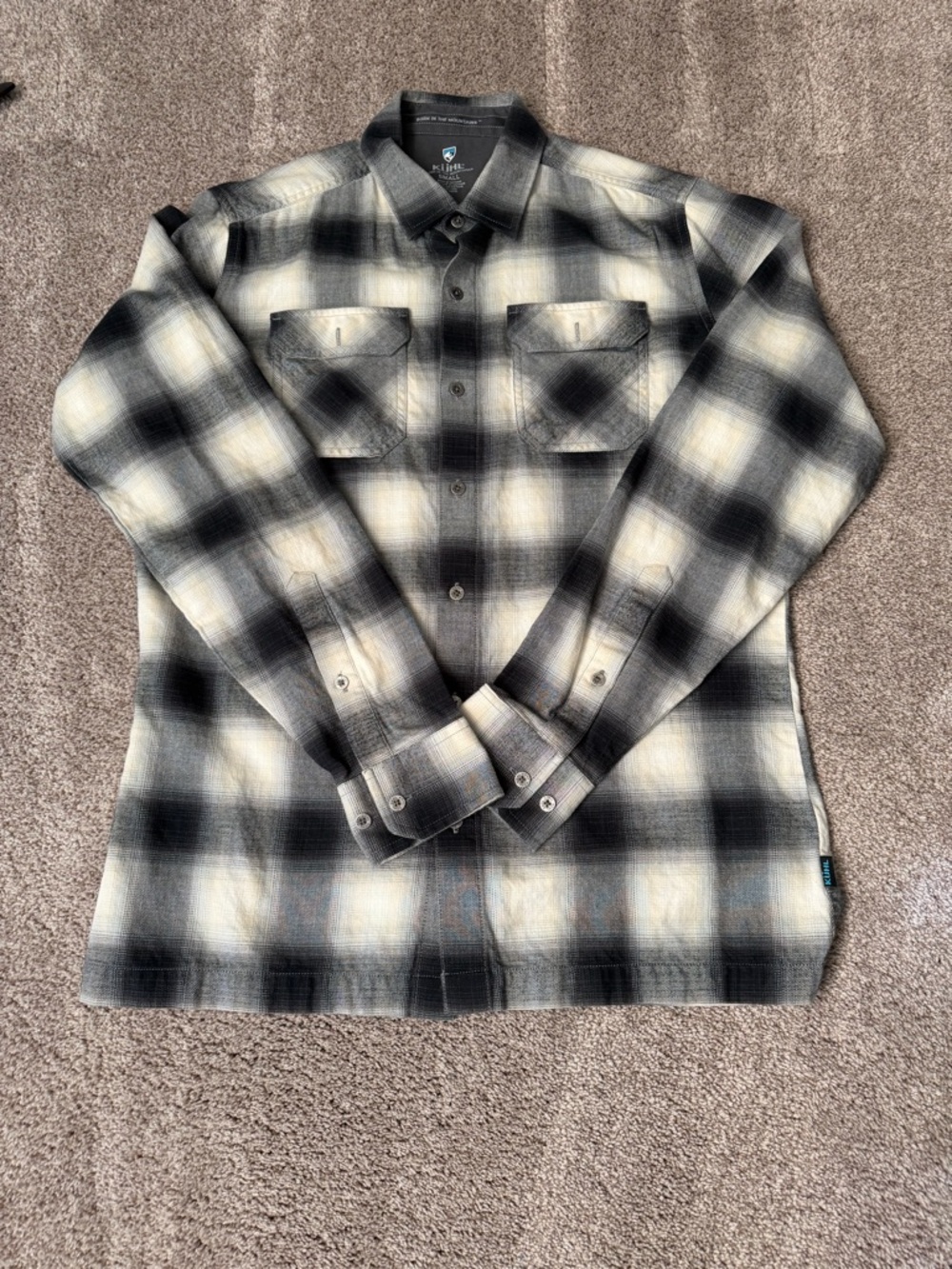 Kuhl Black Shirt with Blue and White Logo